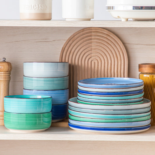 vancasso Bonita 18-Piece Lipped-Edge Stoneware Dinnerware Set in Blue, Unique Spiral Patterns, Ideal for Daily Use, Offering Easy Stacking and Space-Efficient Storage.