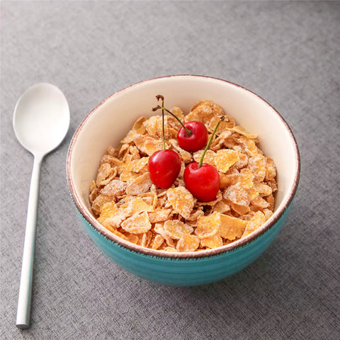 Bella Cereal Bowl Set of 4 in Turquoise with spiral and speckled design - filled with fruit oatmeal-vancasso