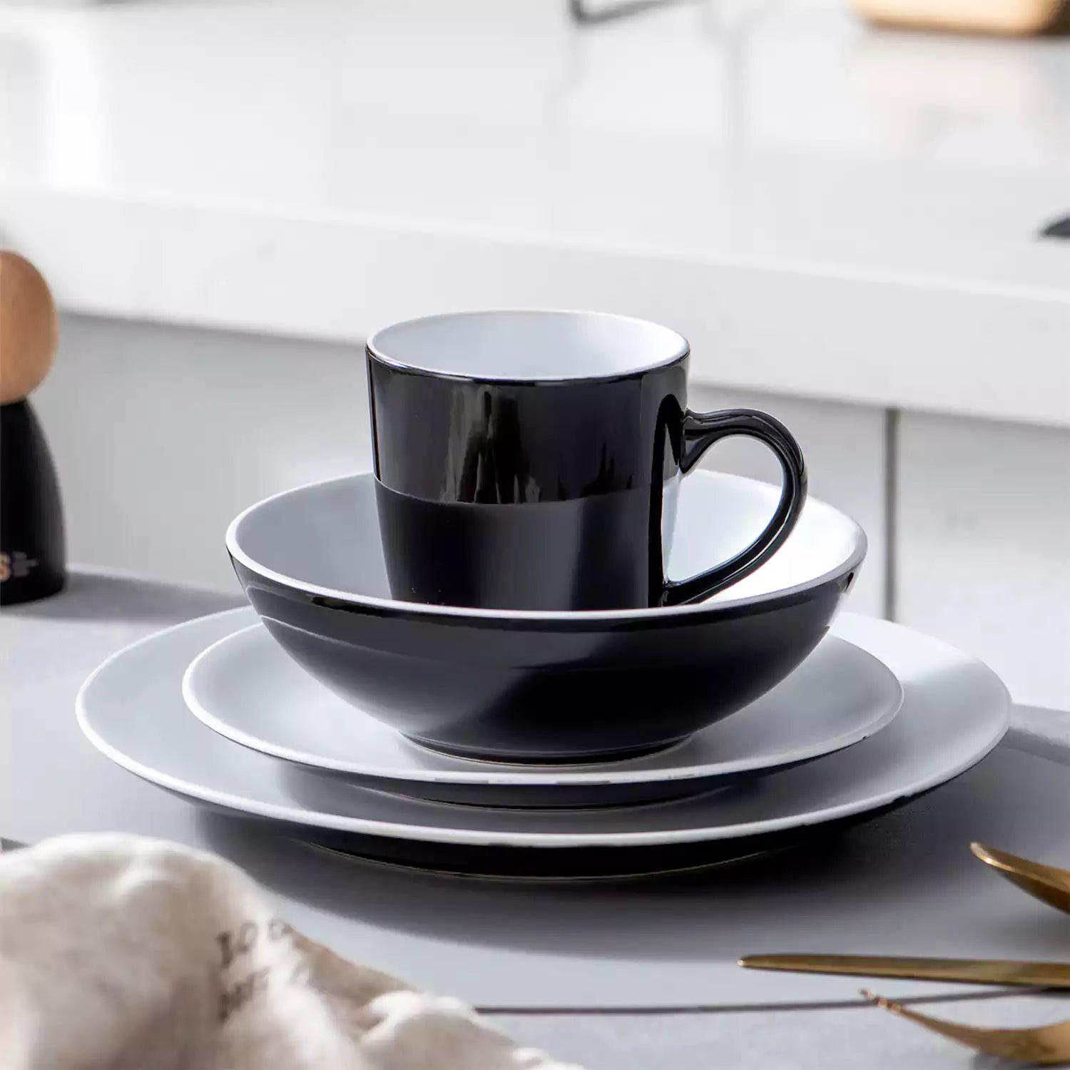 Lento 16 Piece Dinnerware Set in White - featuring matte stoneware with modern black and white design - including plates, bowls, and mugs for a sleek - minimalist table setting-vancasso