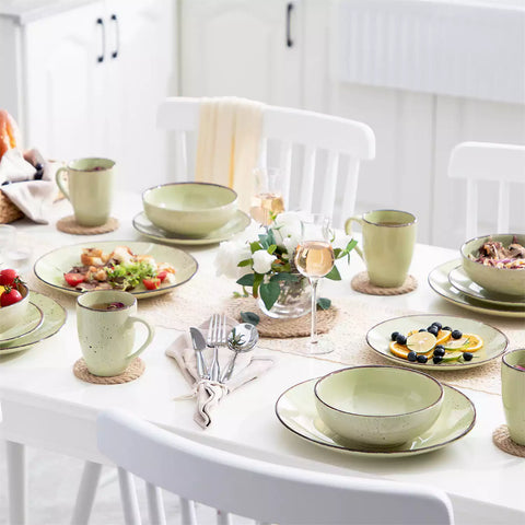 Navia 16 Piece Dinnerware Set in Olive Green with fresh salad and floral tea-vancasso