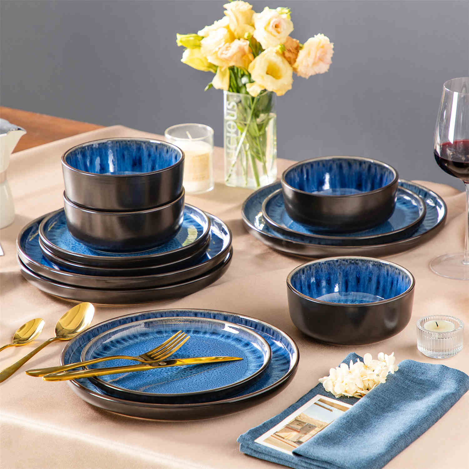 Playa 12-Piece Stoneware Dinnerware Set with plates and bowls for 4 - featuring a unique blue reactive glaze and a farmhouse-inspired style-vancasso