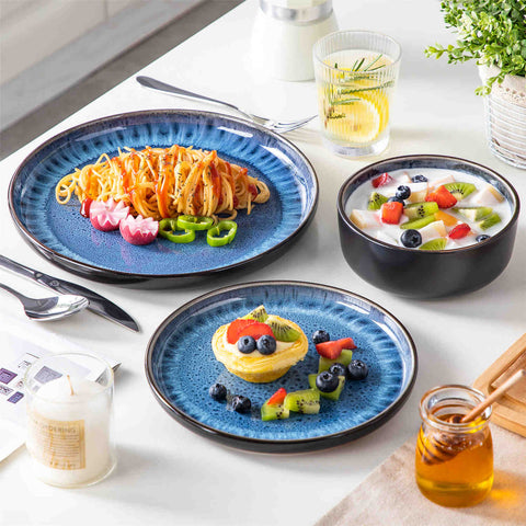 Playa 18-Piece Stoneware Dinnerware Set with plates and bowls for 6 - featuring a unique blue reactive glaze and a farmhouse-inspired style-vancasso