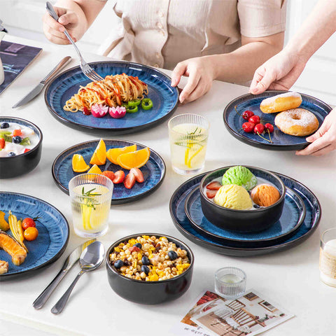 Playa 18-Piece Stoneware Dinnerware Set with plates and bowls for 6 - featuring a unique blue reactive glaze and a farmhouse-inspired style-vancasso