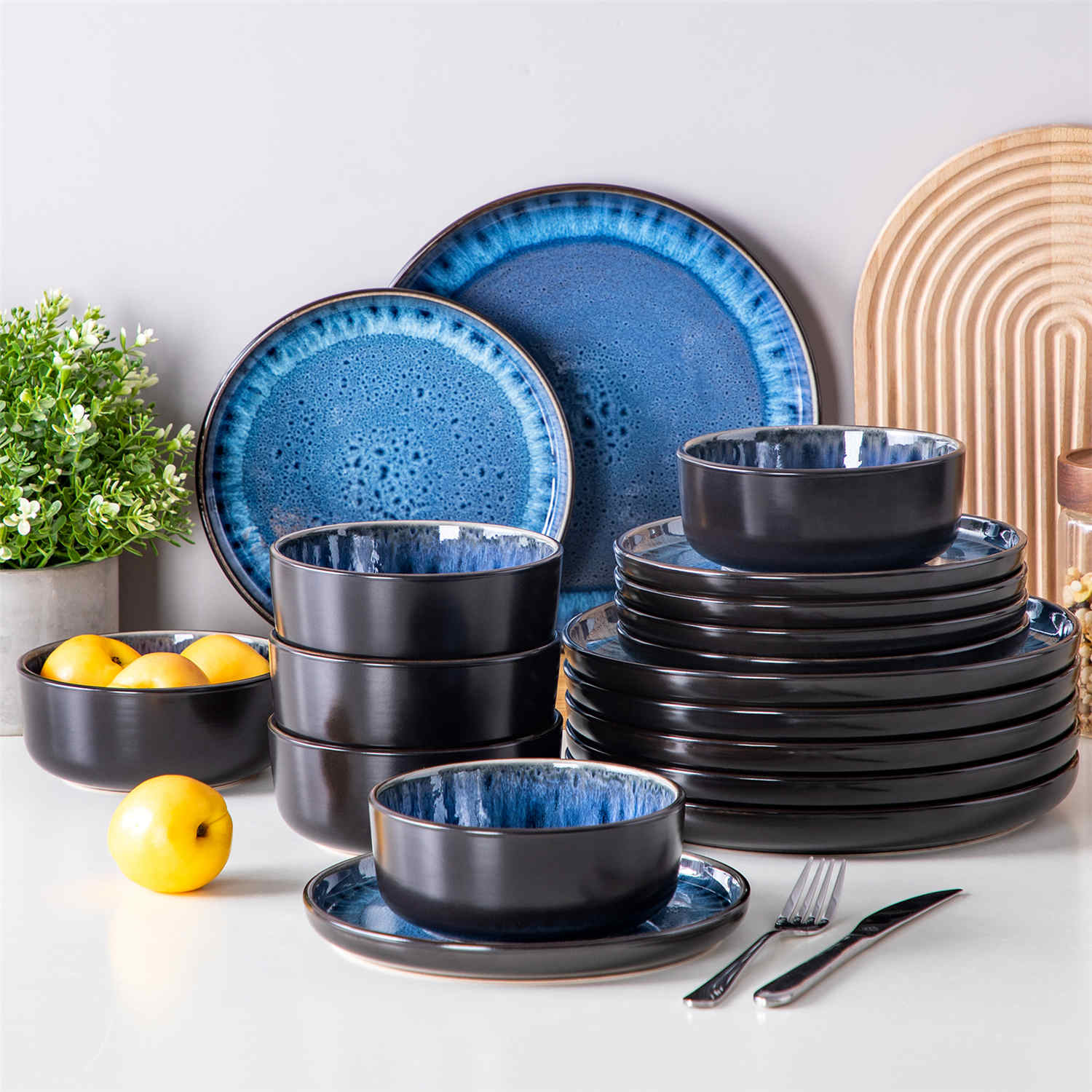 Playa 18-Piece Stoneware Dinnerware Set with plates and bowls for 6 - featuring a unique blue reactive glaze and a farmhouse-inspired style-vancasso