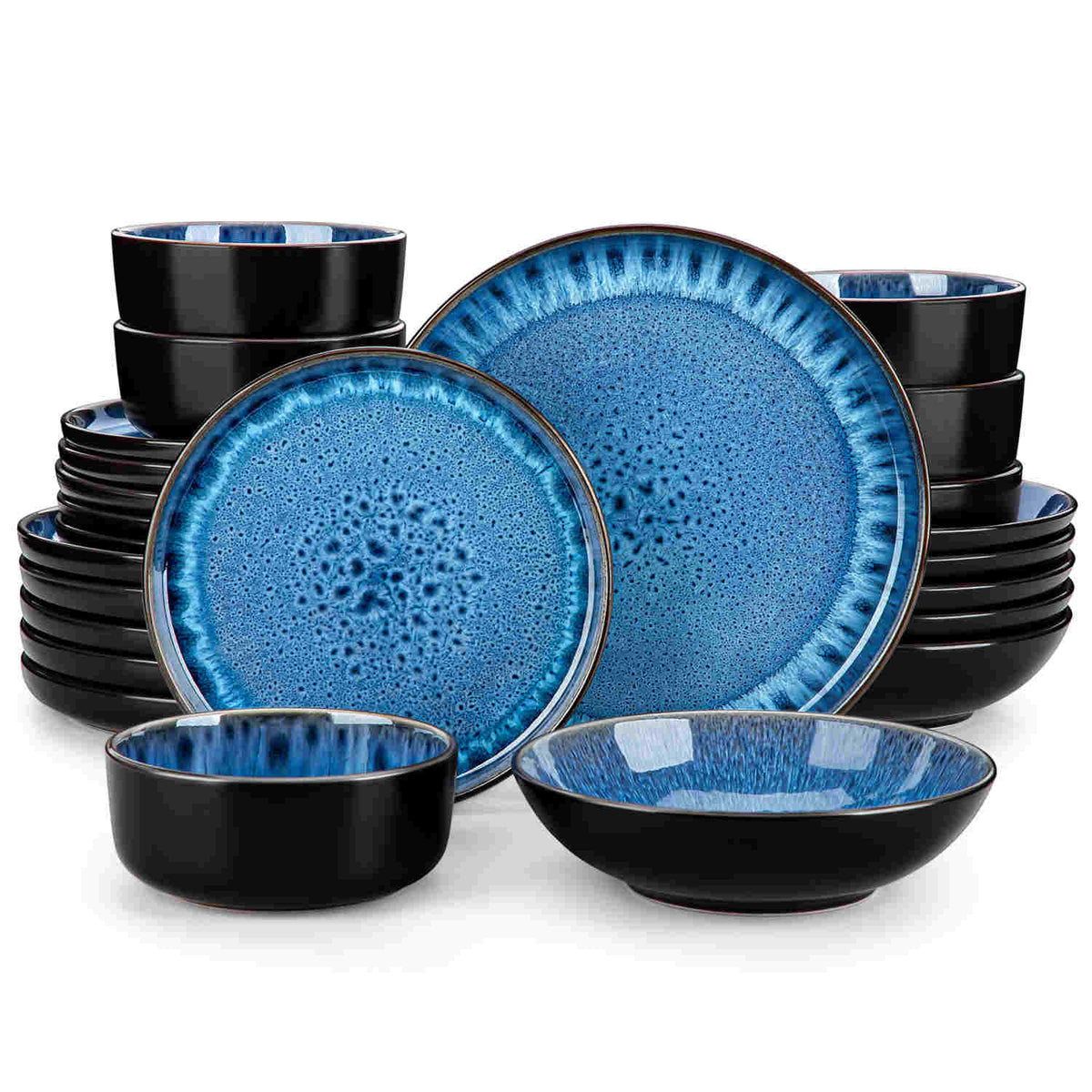 A glossy blue 24-piece stoneware dinnerware set from the Playa collection - featuring farmhouse charm with plates and bowls for 6 people-vancasso