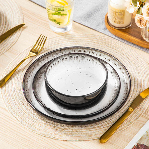 Playa 12-Piece Stoneware Dinnerware Set with plates and bowls for 4 - featuring a unique beige reactive glaze and a farmhouse-inspired style-vancasso