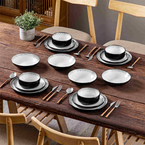 A glossy beige 16-piece stoneware dinnerware set from the Playa collection - featuring farmhouse charm with plates and bowls for 4 people-vancasso