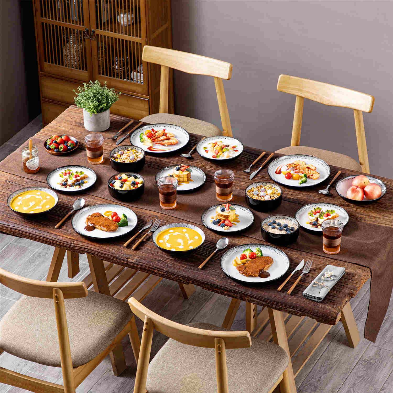 A glossy beige 16-piece stoneware dinnerware set from the Playa collection - featuring farmhouse charm with plates and bowls for 4 people-vancasso