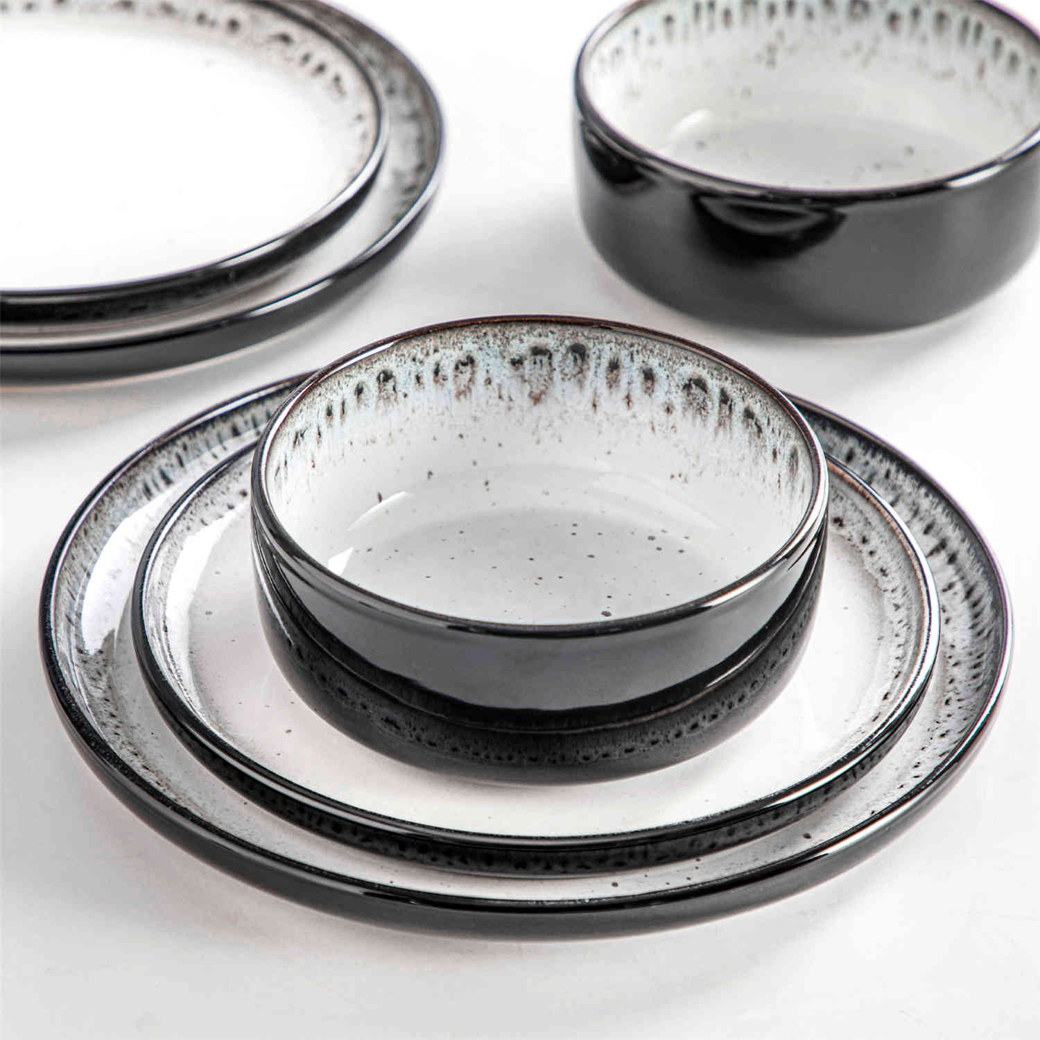 Playa 18-Piece Stoneware Dinnerware Set with plates and bowls for 6 - featuring a unique beige reactive glaze and a farmhouse-inspired style-vancasso