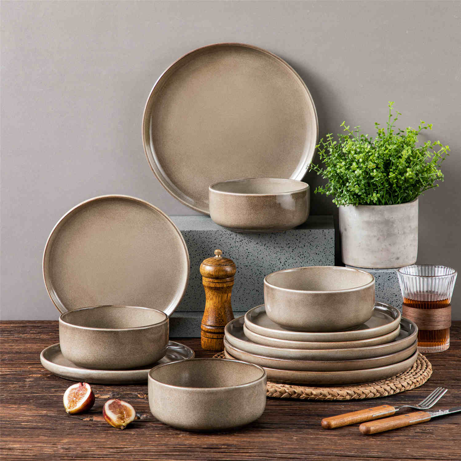 Playa 12-Piece Stoneware Dinnerware Set with plates and bowls for 4 - featuring a unique blue reactive brown and a farmhouse-inspired style-vancasso