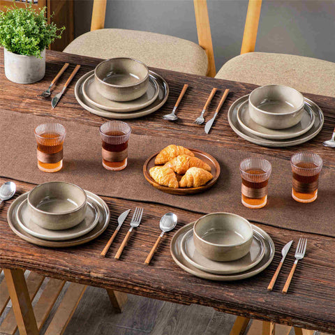 Playa 12-Piece Stoneware Dinnerware Set with plates and bowls for 4 - featuring a unique blue reactive brown and a farmhouse-inspired style-vancasso