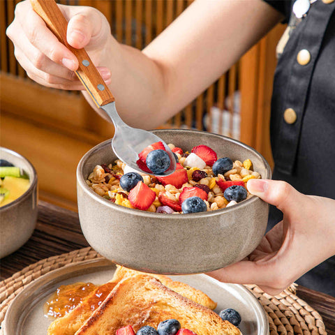 Playa 12-Piece Stoneware Dinnerware Set with plates and bowls for 4 - featuring a unique blue reactive brown and a farmhouse-inspired style-vancasso