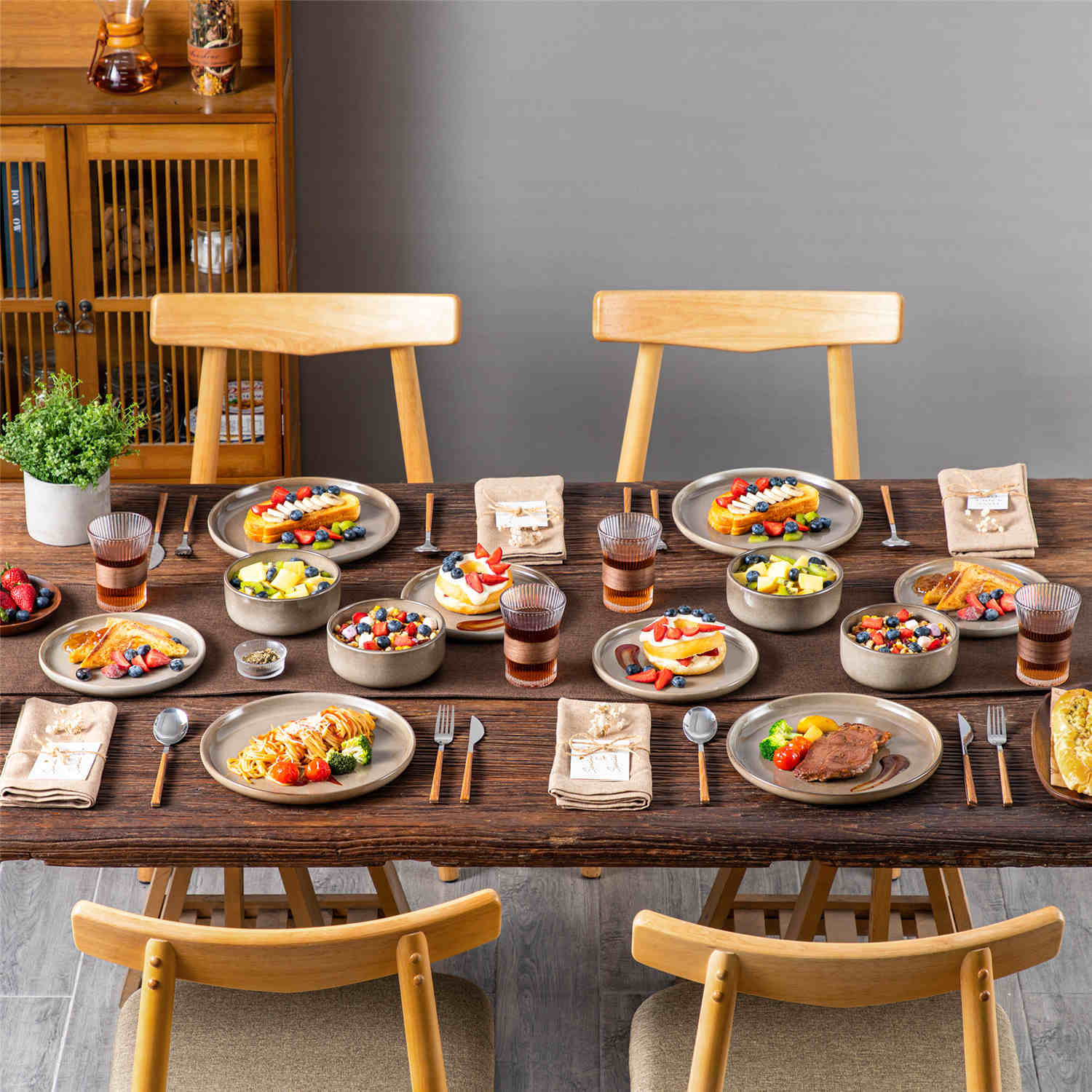 Playa 12-Piece Stoneware Dinnerware Set with plates and bowls for 4 - featuring a unique blue reactive brown and a farmhouse-inspired style-vancasso