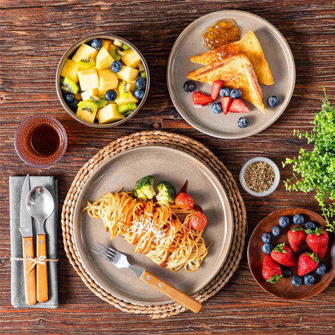 Playa 12-Piece Stoneware Dinnerware Set with plates and bowls for 4 - featuring a unique blue reactive brown and a farmhouse-inspired style-vancasso