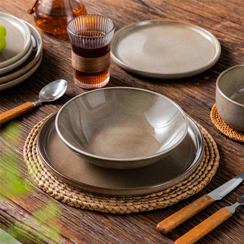 A glossy brown 16-piece stoneware dinnerware set from the Playa collection - featuring farmhouse charm with plates and bowls for 4 people-vancasso