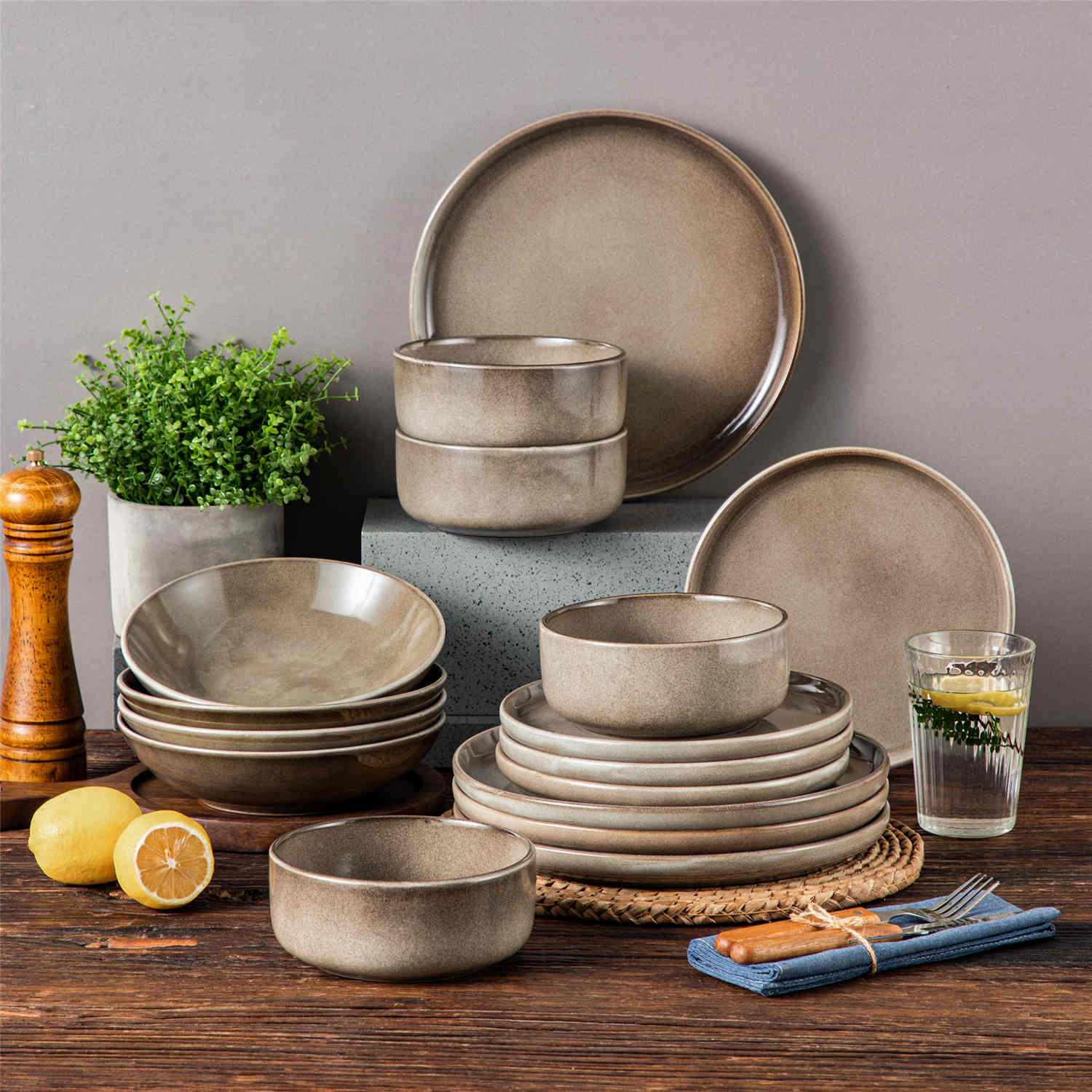 A glossy brown 16-piece stoneware dinnerware set from the Playa collection - featuring farmhouse charm with plates and bowls for 4 people-vancasso