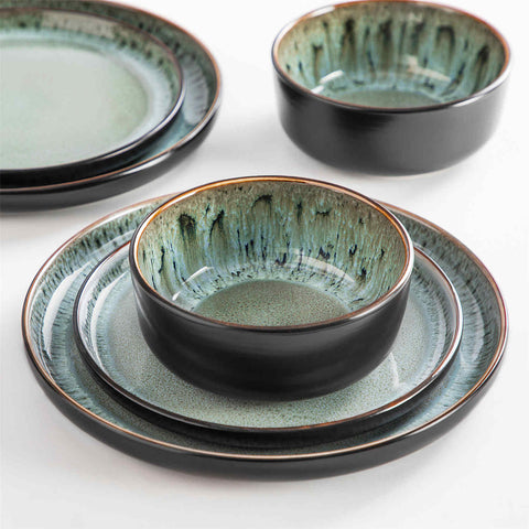 Playa 18-Piece Stoneware Dinnerware Set with plates and bowls for 6 - featuring a unique dark green reactive glaze and a farmhouse-inspired style-vancasso