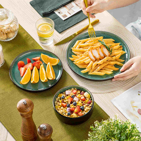 Playa 12-Piece Stoneware Dinnerware Set with plates and bowls for 4 - featuring a unique green reactive glaze and a farmhouse-inspired style-vancasso