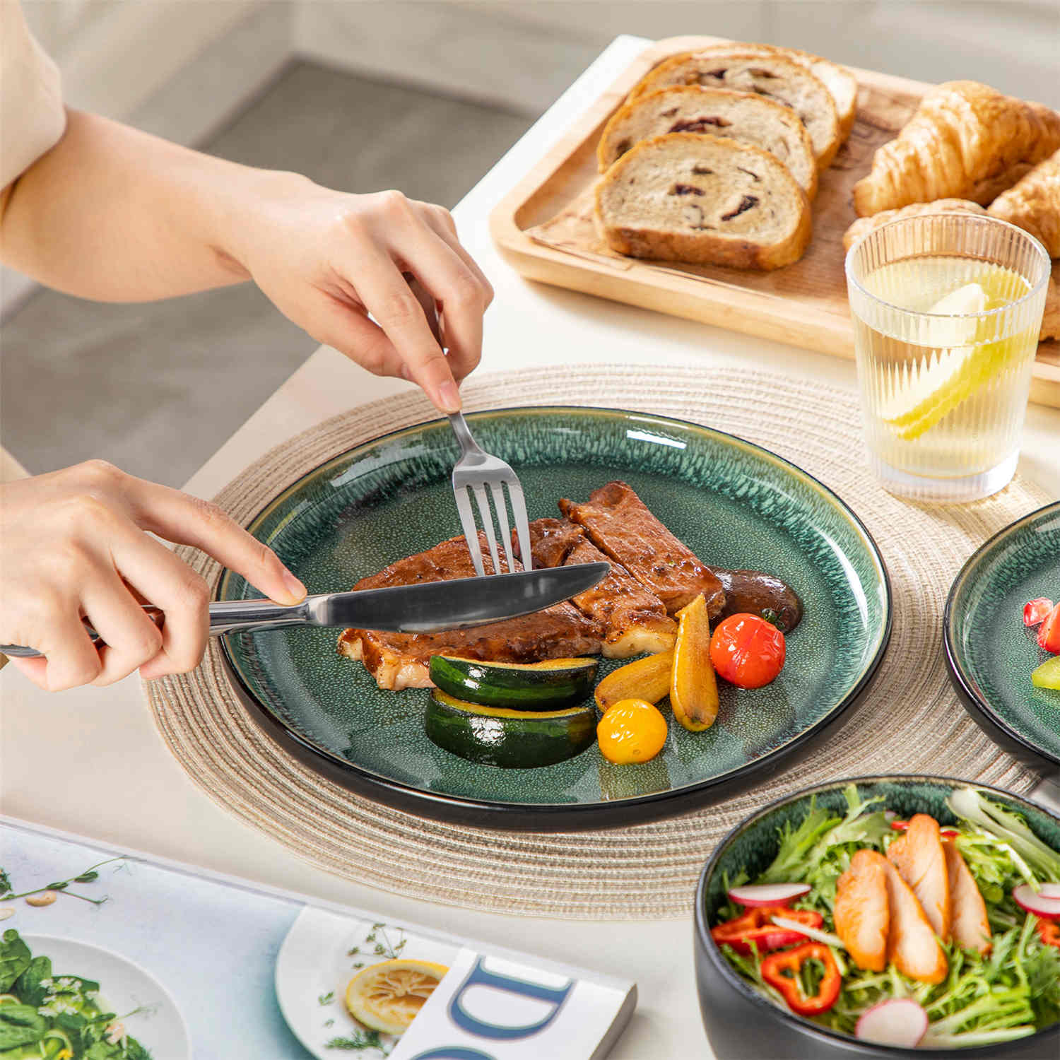 Playa 18-Piece Stoneware Dinnerware Set with plates and bowls for 6 - featuring a unique green reactive glaze and a farmhouse-inspired style-vancasso