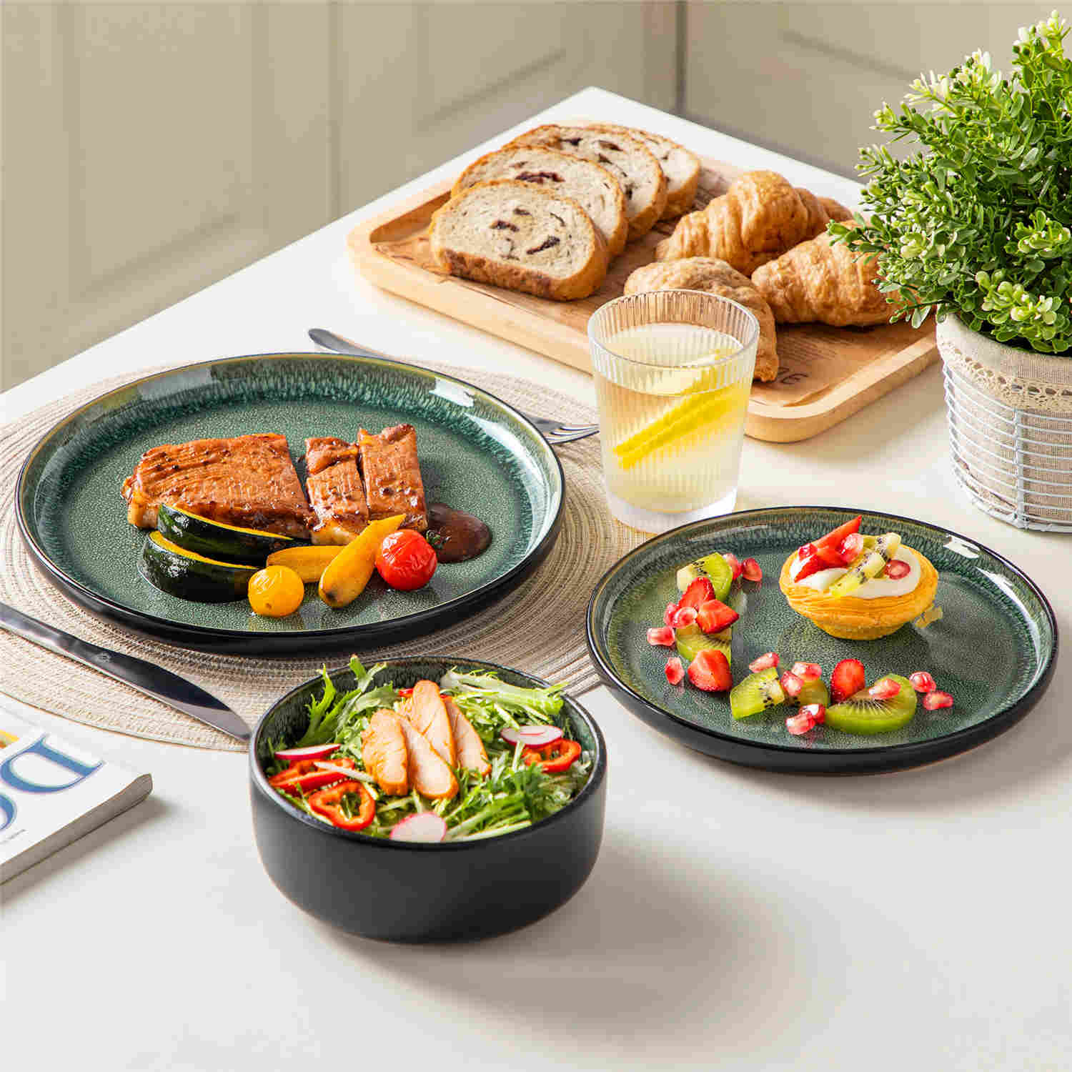 Playa 18-Piece Stoneware Dinnerware Set with plates and bowls for 6 - featuring a unique green reactive glaze and a farmhouse-inspired style-vancasso