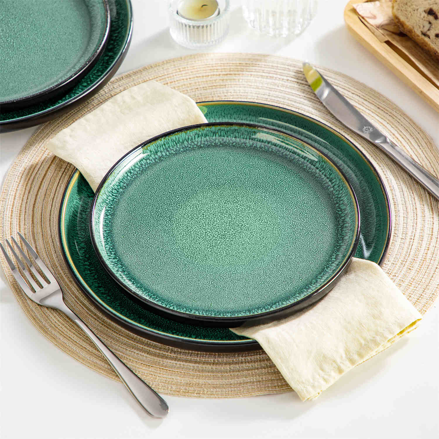 A glossy green 24-piece stoneware dinnerware set from the Playa collection - featuring farmhouse charm with plates and bowls for 6 people-vancasso