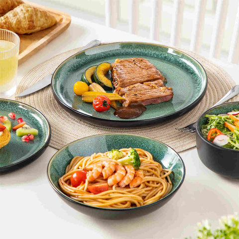 A glossy green 24-piece stoneware dinnerware set from the Playa collection - featuring farmhouse charm with plates and bowls for 6 people-vancasso