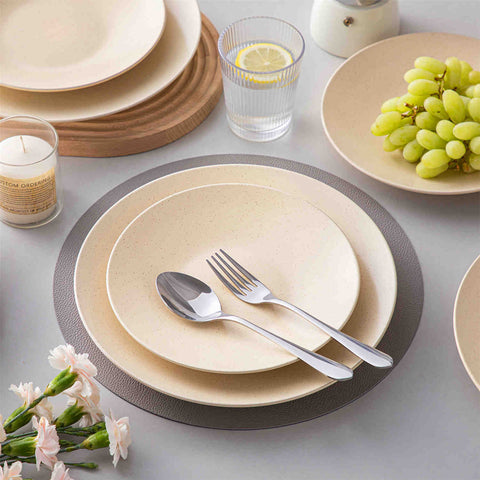 The Sabine 12-Piece Stoneware Dinnerware Set features a semi-matte finish and a modern round design in beige - providing service for 4 with both plates and bowls-vancasso