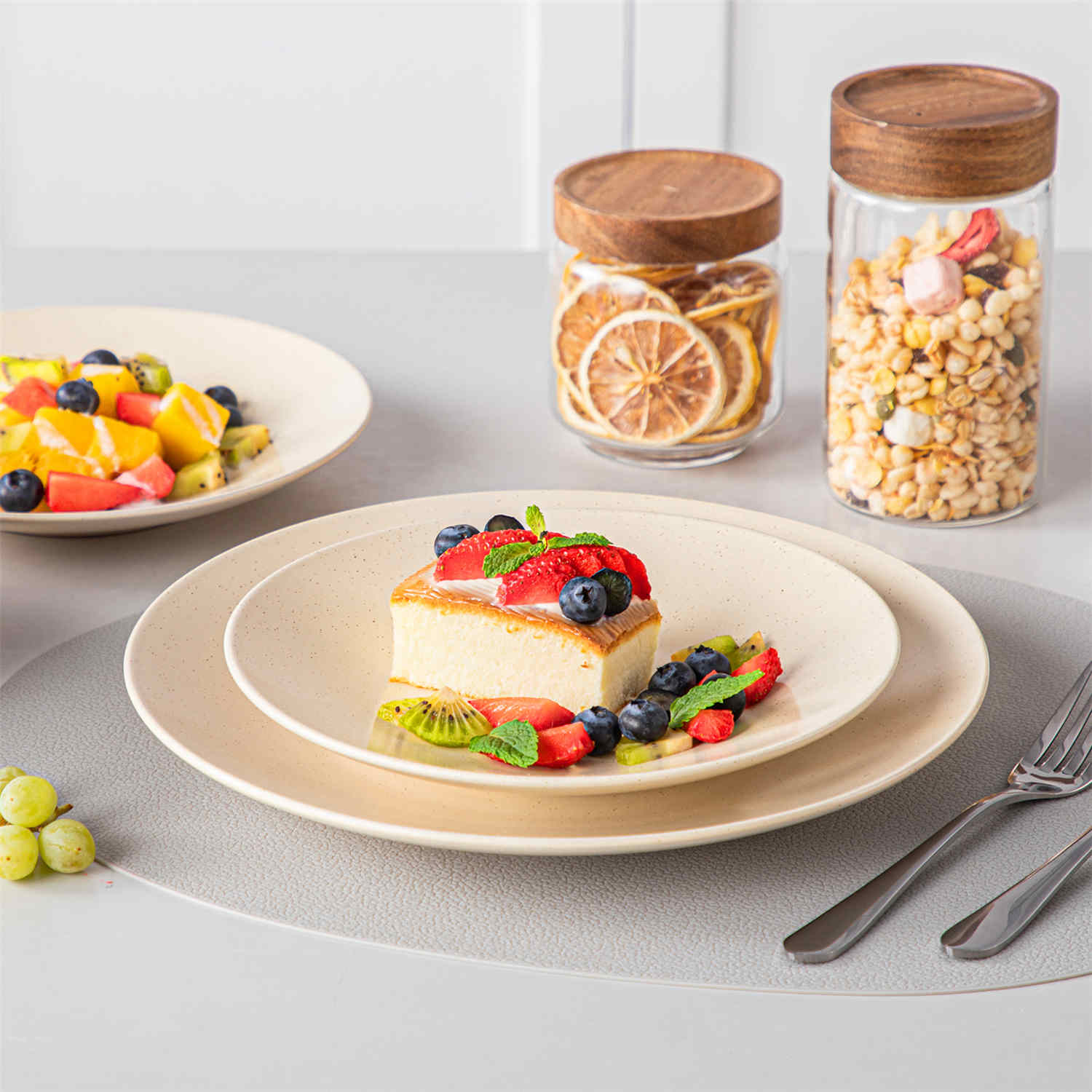 The Sabine 12-Piece Stoneware Dinnerware Set features a semi-matte finish and a modern round design in beige - providing service for 4 with both plates and bowls-vancasso