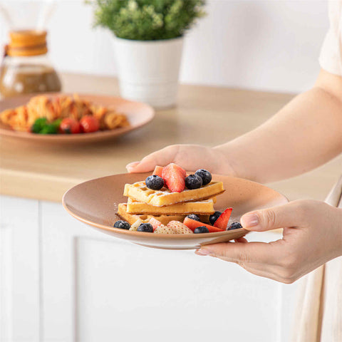 The Sabine 12-Piece Stoneware Dinnerware Set features a semi-matte finish and a modern round design in multicolor - providing service for 4 with both plates and bowls-vancasso