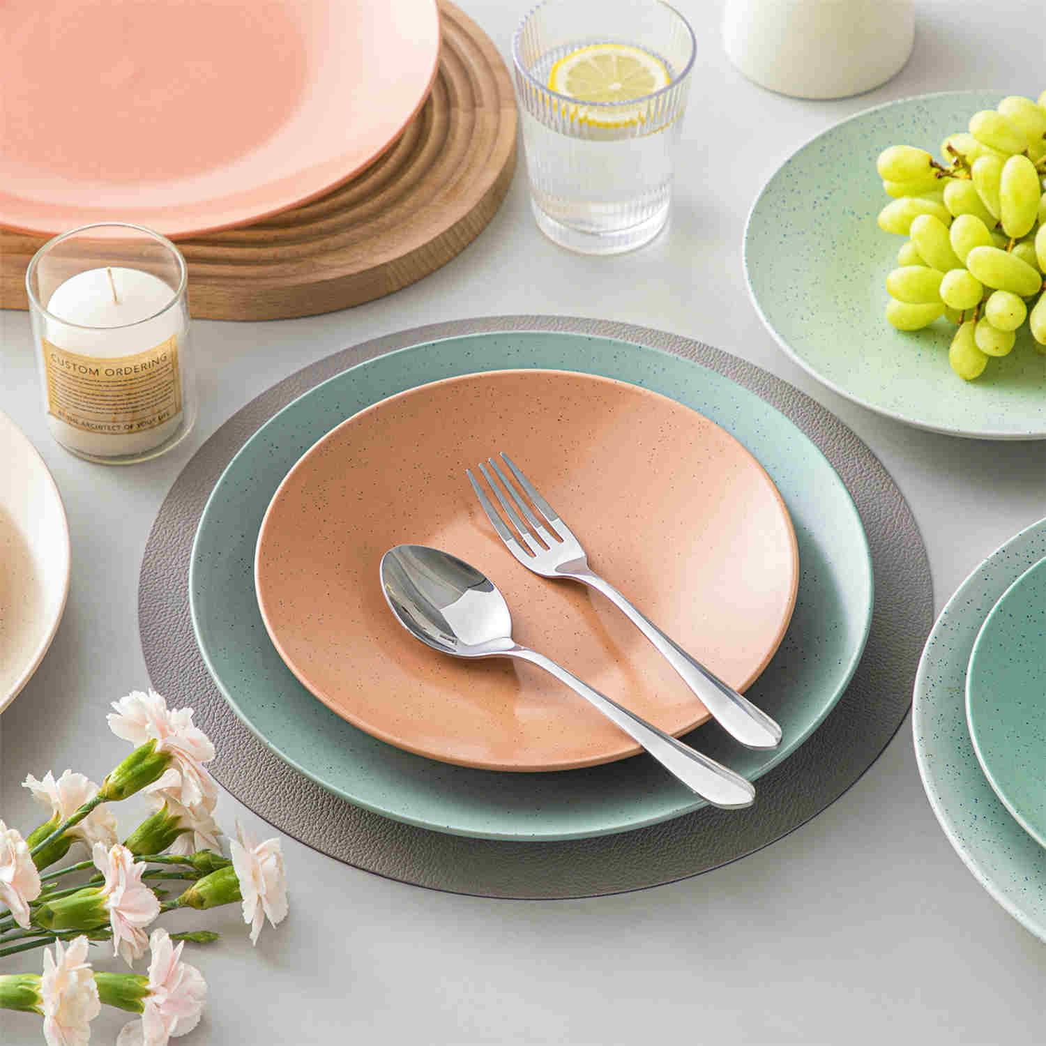 The Sabine 12-Piece Stoneware Dinnerware Set features a semi-matte finish and a modern round design in multicolor - providing service for 4 with both plates and bowls-vancasso