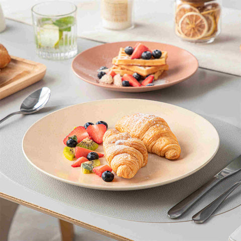 The Sabine 12-Piece Stoneware Dinnerware Set features a semi-matte finish and a modern round design in multicolor - providing service for 4 with both plates and bowls-vancasso