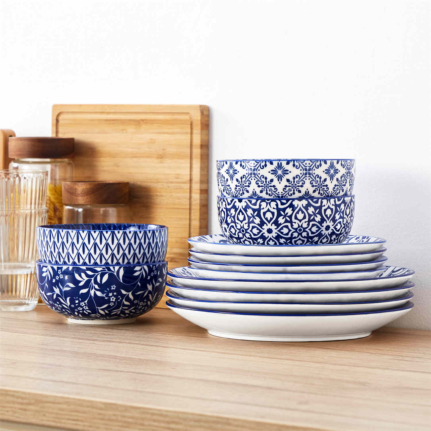 Selene 12-Piece Porcelain Dinnerware Set with blue and white glaze and Japanese-inspired design, including matching plates and bowls-vancasso