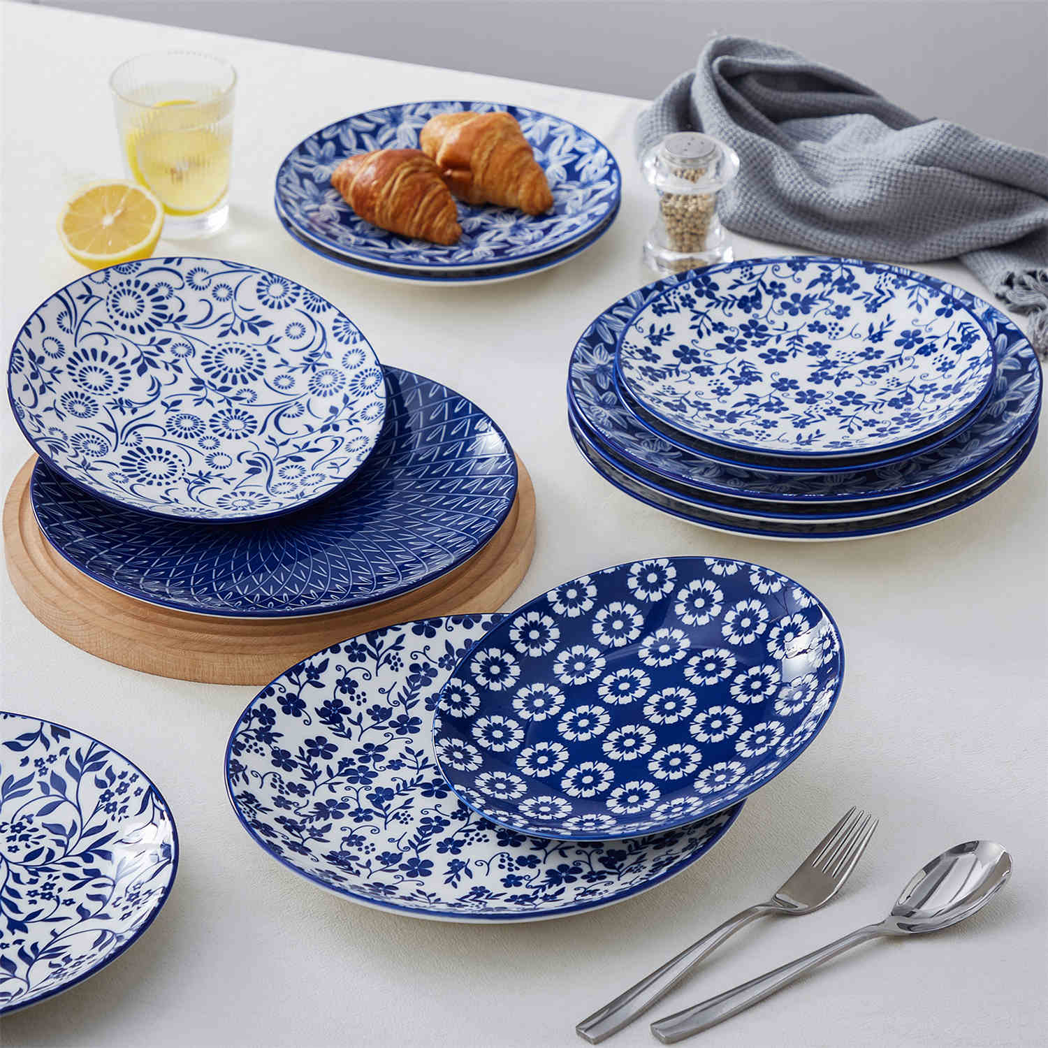 Selene 6-Piece Porcelain Salad Plates Set in Blue and White, adorned with exquisite Japanese-inspired floral motifs and a lustrous finish-vancasso