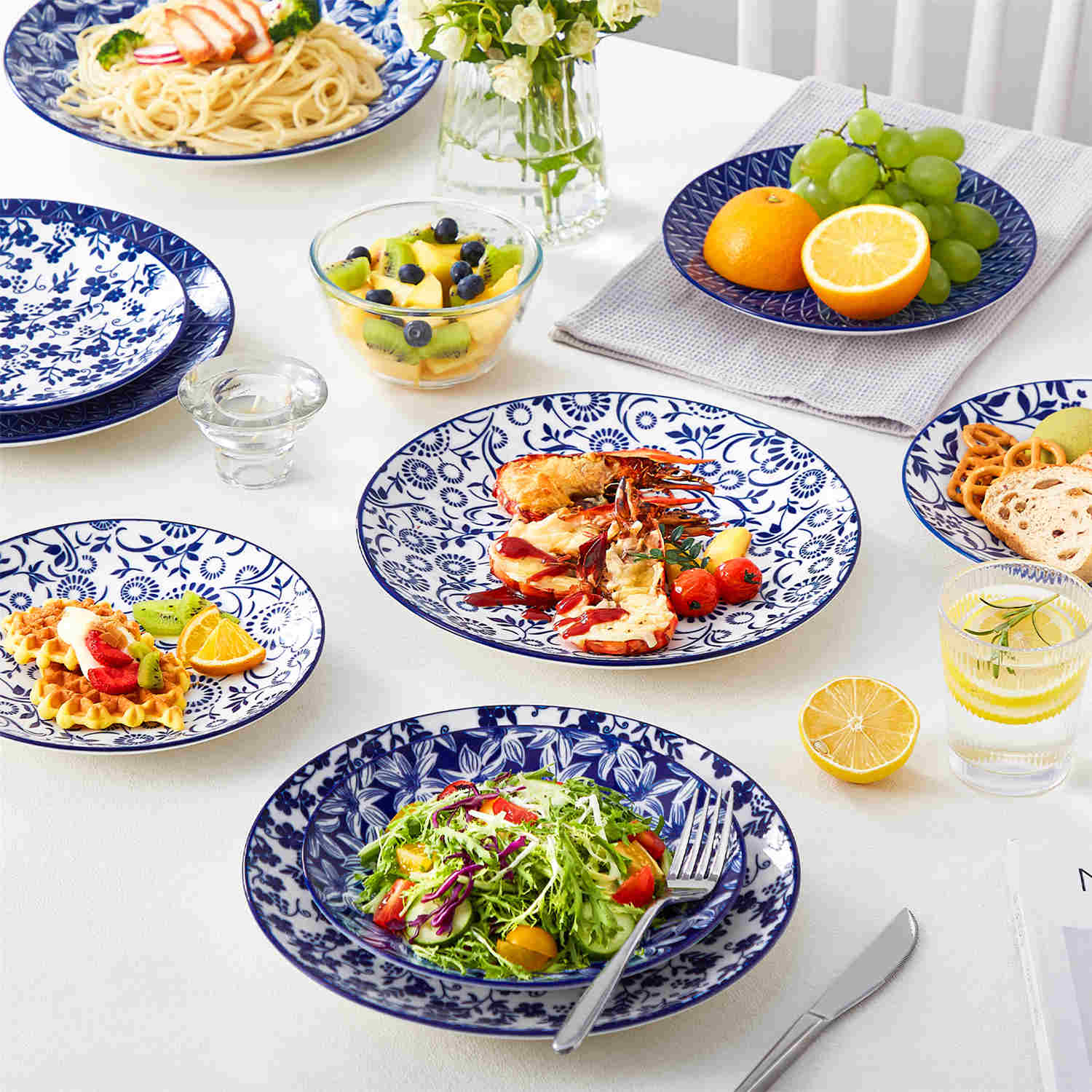 Selene 6-Piece Porcelain Salad Plates Set in Blue and White, adorned with exquisite Japanese-inspired floral motifs and a lustrous finish-vancasso