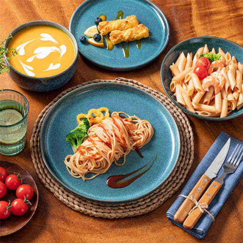 vancasso Vega 16-Piece Stoneware Dinnerware Set, Showcasing a Stunning Reactive Glaze Finish that Creates Unique, Vibrant Patterns on Each Piece. Featuring Dual-Sided Kiln Transformations, This Set Adds Depth and Character to Your Table Setting.