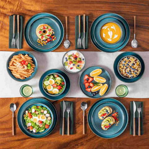 vancasso Vega 16-Piece Stoneware Dinnerware Set, Showcasing a Stunning Reactive Glaze Finish that Creates Unique, Vibrant Patterns on Each Piece. Featuring Dual-Sided Kiln Transformations, This Set Adds Depth and Character to Your Table Setting.