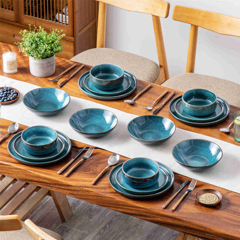 vancasso Vega 16-Piece Stoneware Dinnerware Set, Showcasing a Stunning Reactive Glaze Finish that Creates Unique, Vibrant Patterns on Each Piece. Featuring Dual-Sided Kiln Transformations, This Set Adds Depth and Character to Your Table Setting.